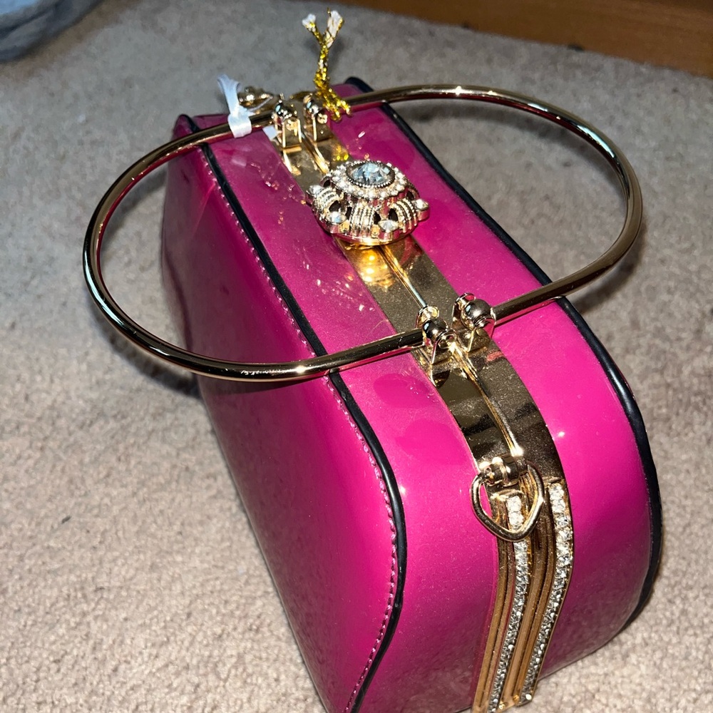 Pink Rose colored gold handle clutch bag